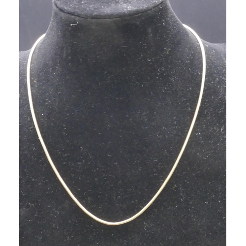 728 - A 9ct gold snake linked chain, 42cm long, 6 grams