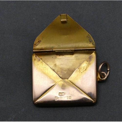 729 - A 9ct gold pendant in the form of an envelope, 3.8 grams (with engraved monogram)