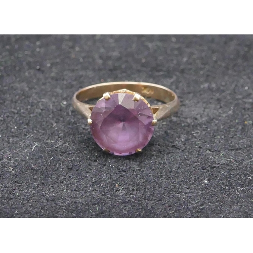 747 - A 9ct gold ladies' ring set with circular amethyst, size P/Q, 3.2 grams gross