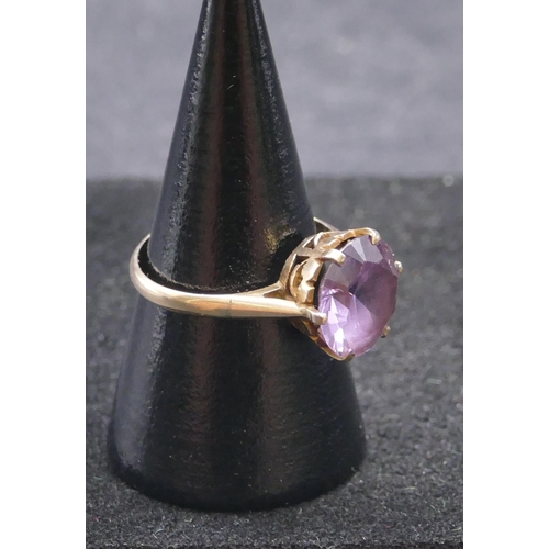 747 - A 9ct gold ladies' ring set with circular amethyst, size P/Q, 3.2 grams gross