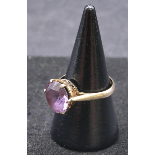 747 - A 9ct gold ladies' ring set with circular amethyst, size P/Q, 3.2 grams gross