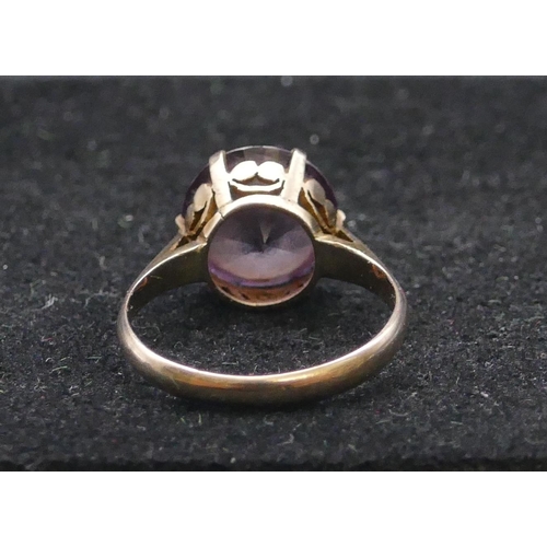 747 - A 9ct gold ladies' ring set with circular amethyst, size P/Q, 3.2 grams gross