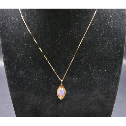 752 - A 9ct gold drop pendant set with opal, with chain, 3.4 grams gross