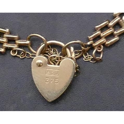 754 - A 9ct gold gate bracelet with padlock clasp, 4.3 grams