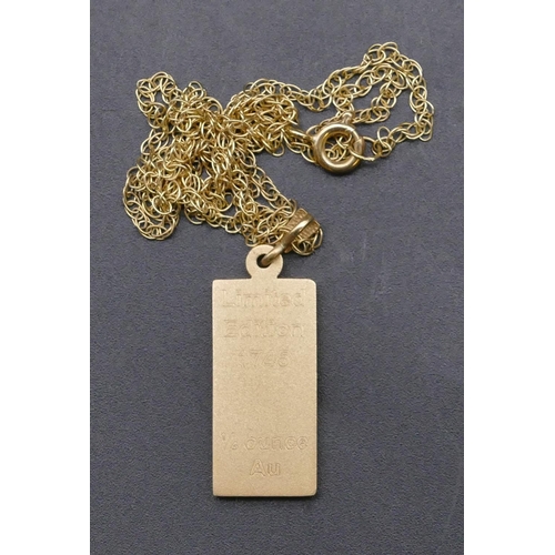 758 - A 9ct gold 2000 Limited Edition drop nugget pendant with chain, 10 grams