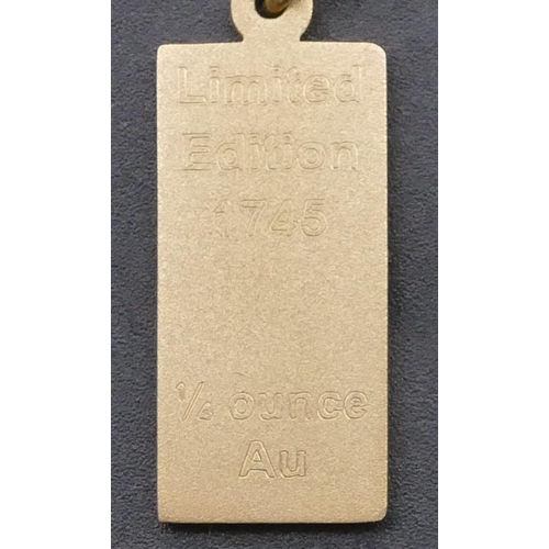 758 - A 9ct gold 2000 Limited Edition drop nugget pendant with chain, 10 grams