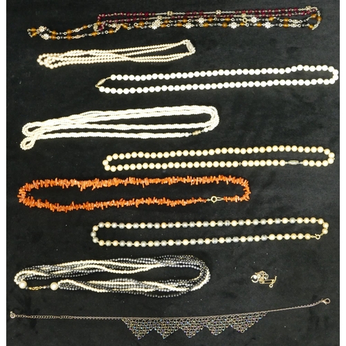 763 - A Mother of Pearl bead necklace and a quantity of various other necklaces including coral etc.