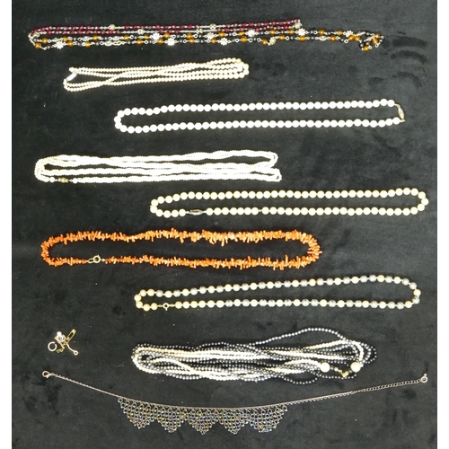 763 - A Mother of Pearl bead necklace and a quantity of various other necklaces including coral etc.