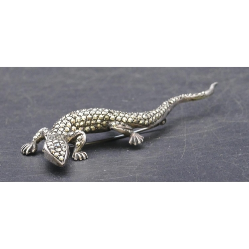 773 - A cut steel brooch in the form of a lizard, 9.5cm long