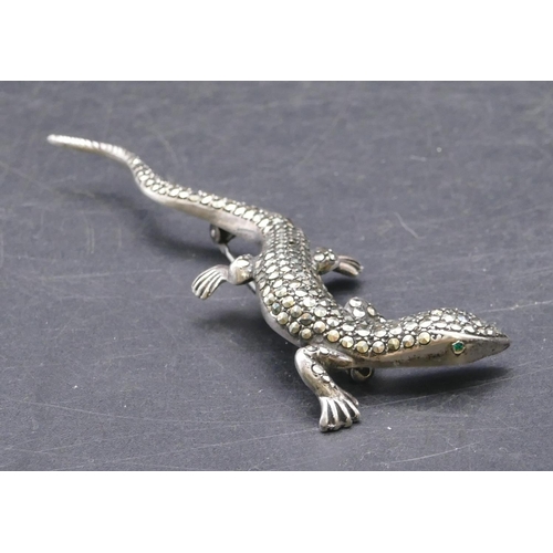 773 - A cut steel brooch in the form of a lizard, 9.5cm long