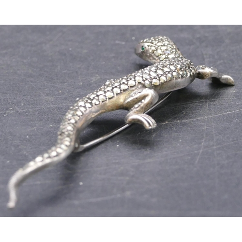 773 - A cut steel brooch in the form of a lizard, 9.5cm long