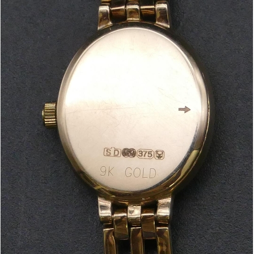 778 - A 9ct gold ladies' Rotary Elite wrist watch with matching strap bracelet, white enamel dial, overall... 