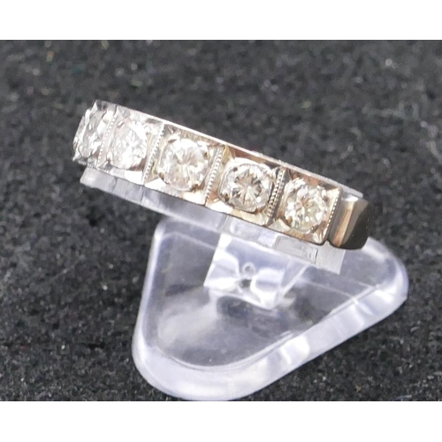 782 - An 18ct white gold ladies' half eternity ring set with 7 diamonds, each approx. 0.20 carat, size Q, ... 