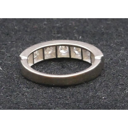 782 - An 18ct white gold ladies' half eternity ring set with 7 diamonds, each approx. 0.20 carat, size Q, ... 