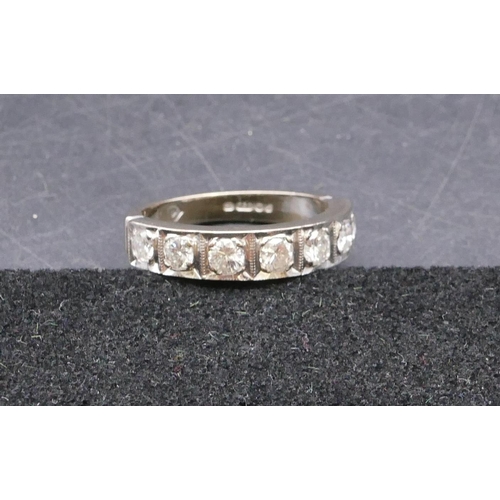 782 - An 18ct white gold ladies' half eternity ring set with 7 diamonds, each approx. 0.20 carat, size Q, ... 