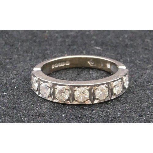 782 - An 18ct white gold ladies' half eternity ring set with 7 diamonds, each approx. 0.20 carat, size Q, ... 