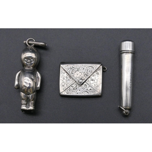 787 - A Scottish silver rattle in the form of a baby, a small Birmingham silver pendant in the form of an ... 