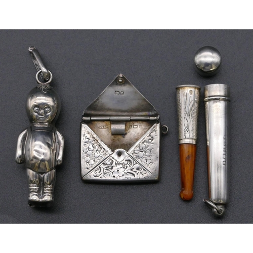 787 - A Scottish silver rattle in the form of a baby, a small Birmingham silver pendant in the form of an ... 