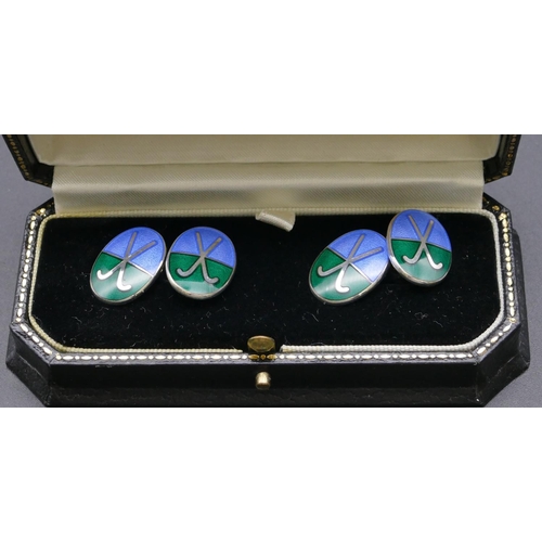 792 - A pair of silver oval hockey cufflinks with pale blue and green enamel decoration (boxed)