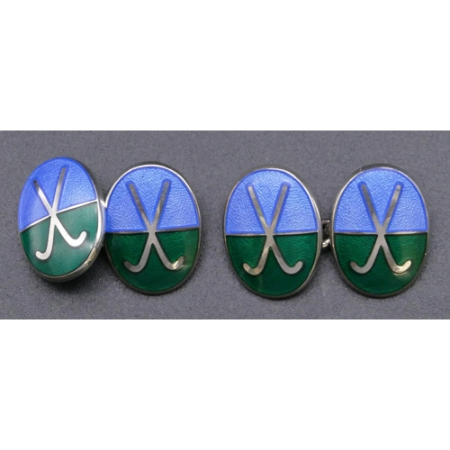 792 - A pair of silver oval hockey cufflinks with pale blue and green enamel decoration (boxed)