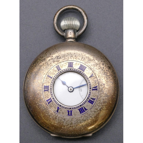 795 - A 925 silver half hunter pocket watch with white enamel dial, seconds dial and Roman numerals (not w... 