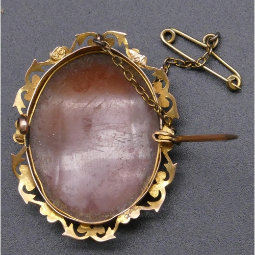 796 - A 9ct gold oval cameo, shoulder length portrait of a lady, 3.7cm high overall, 5.4 grams gross