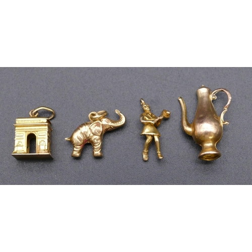 799 - 2 9ct gold charms and 2 further gold charms, 5.1 grams