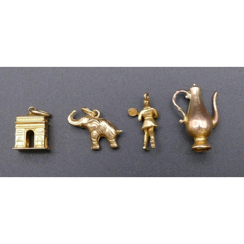 799 - 2 9ct gold charms and 2 further gold charms, 5.1 grams