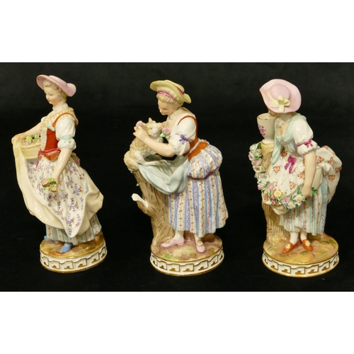 80 - A set of 3 Meissen figures of standing ladies (lady standing next to pedestal flowers missing from v... 