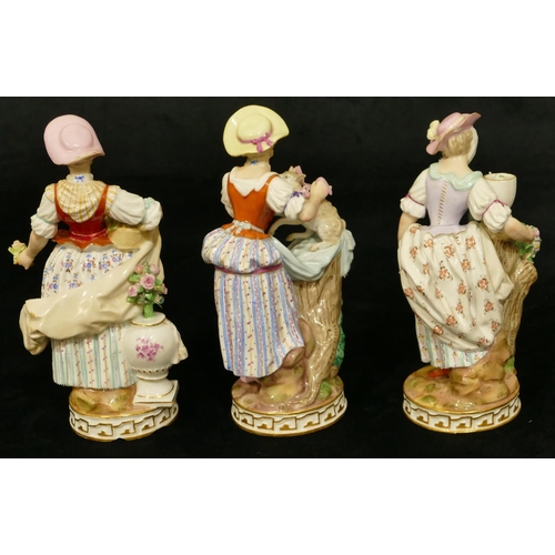 80 - A set of 3 Meissen figures of standing ladies (lady standing next to pedestal flowers missing from v... 