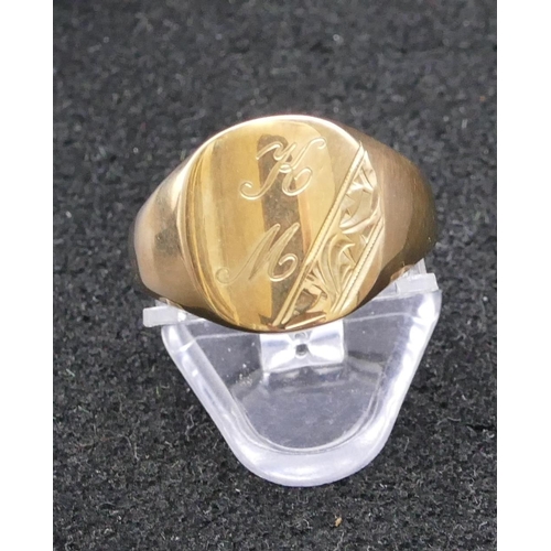 801 - A 9ct gold signet ring with engraved initials, size R/S, 5.7 grams