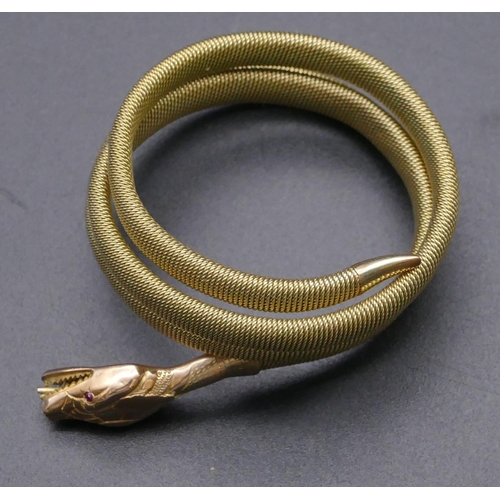 807 - A 9ct gold serpent bangle with entwined body, 20.2 grams gross