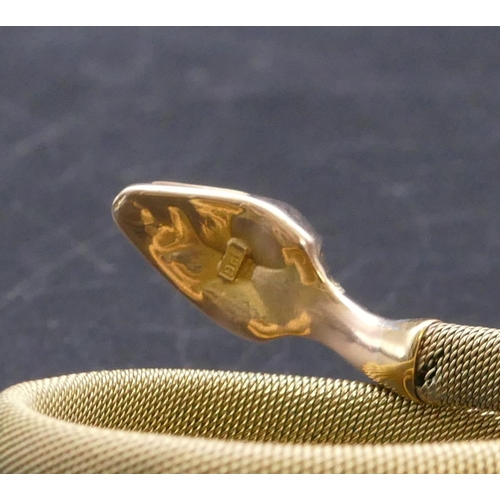 807 - A 9ct gold serpent bangle with entwined body, 20.2 grams gross