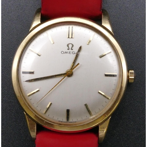 809 - An Omega gold circular gentleman's wristwatch with seconds hand and red leather strap bracelet (engr... 