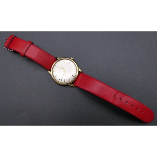 809 - An Omega gold circular gentleman's wristwatch with seconds hand and red leather strap bracelet (engr... 