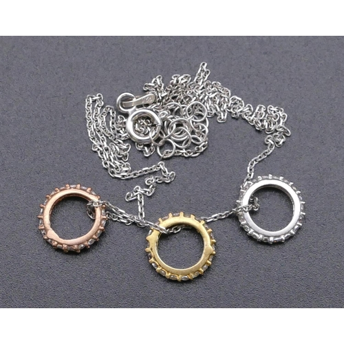 811 - A 925 silver chain mounted with 3 circles and inset with clear stones.