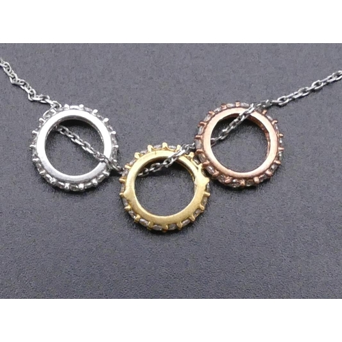 811 - A 925 silver chain mounted with 3 circles and inset with clear stones.