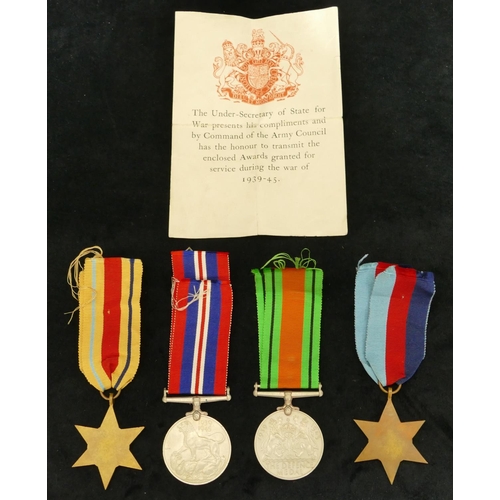 819 - 4 WWII medals, 1939-45 medal, Defence Medal, 39-45 Star and the African Star, in box.