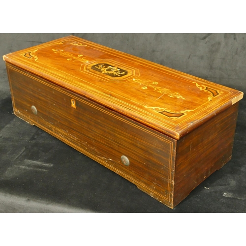 834 - A 19th Century walnut musical box with allover inlaid decoration, hinged lid (18 teeth missing and n... 