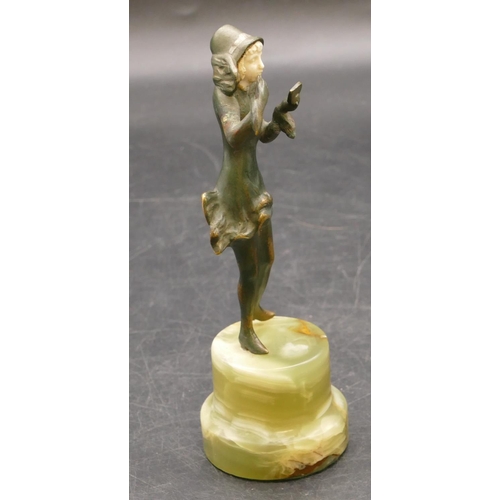 839 - An Art Deco style bronze figure of a lady powdering her face, on green onyx stand, 15.5cm high