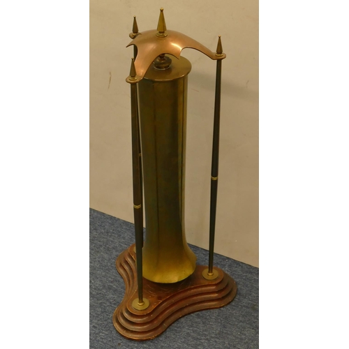 842 - An early 20th Century brass and copper floor gong (old gun shell) on mahogany tripod base, 70cm high