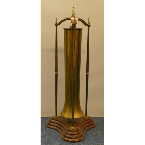 842 - An early 20th Century brass and copper floor gong (old gun shell) on mahogany tripod base, 70cm high