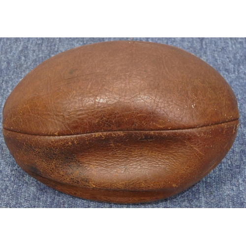 A British Lions signed Adidas Wallaby rugby ball and an early brown leather rugby ball. 2