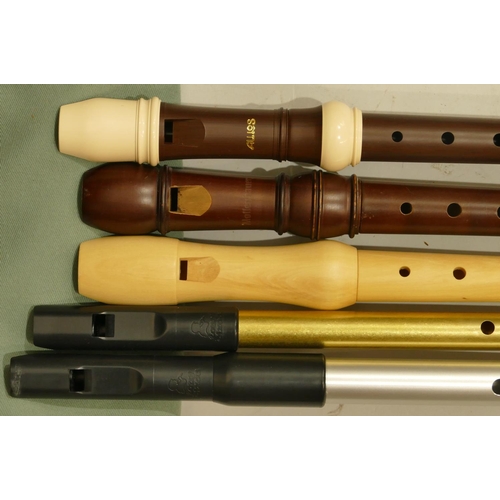 990 - 24 various wood, brass, aluminium and plastic small recorders, whistles and flutes  including Tony D... 