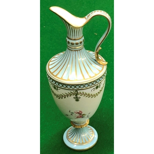 192 - A Royal Crown Derby small round bulbous thin necked ewer on turquoise and cream ground with hand pai... 