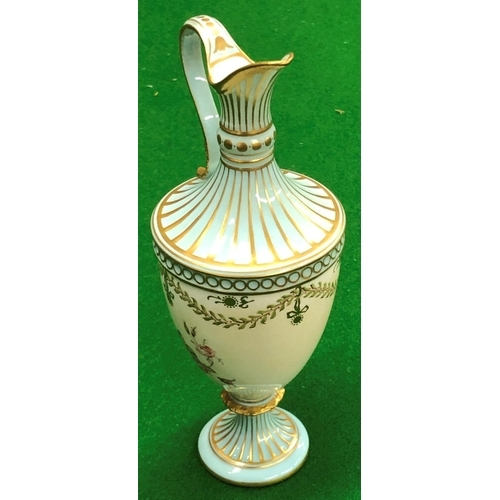 192 - A Royal Crown Derby small round bulbous thin necked ewer on turquoise and cream ground with hand pai... 