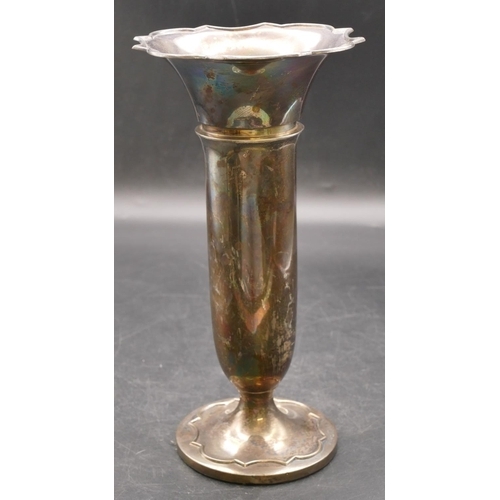 282 - A Birmingham silver round trumpet shaped spill vase with crinkled rim on round weighted base, 23cm h... 