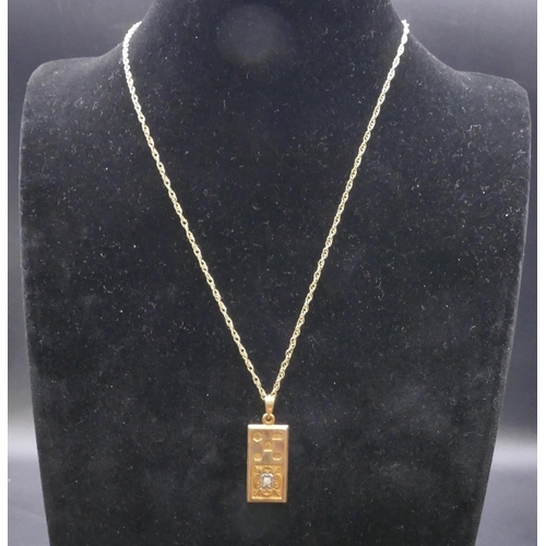 761 - A 9ct gold Limited Edition nugget pendant set with small diamond, with chain, 10 grams gross