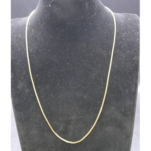 766 - A 9ct gold square linked chain, 55cm long, 6.2 grams