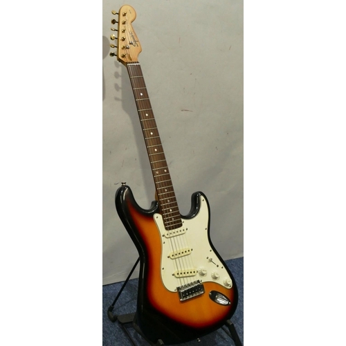 1076 - Squire Strat by Fender 6-string electric guitar, overall length 99cm.